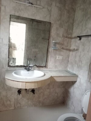 Bathroom in 3 BHK Apartment at Arun Vihar Sector 37, Sector 37 – for Rent
