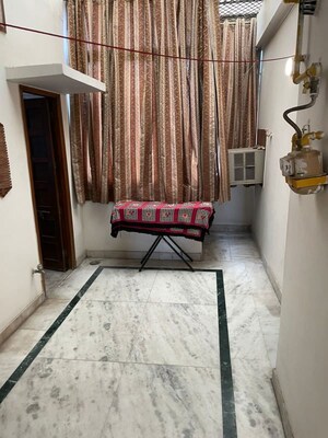 Bedroom in 2 BHK Builder Floor at South Extension I – for Rent
