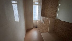 Bathroom in 3 BHK Apartment at Omkar Alta Monte, Malad East – for Rent