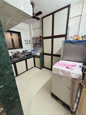 Kitchen in 1 BHK Apartment at Amba Mata Krupa CHS, Dombivli East – for Sale