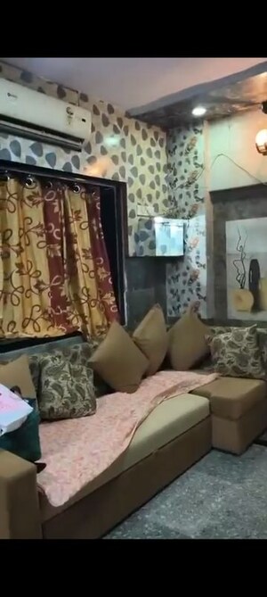 Living Room in 2 BHK Apartment at Nav Munjal Nagar CHS, Govandi – for Rent