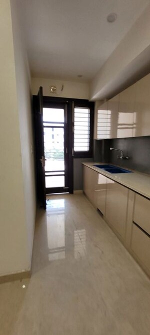 Kitchen in 2 BHK Builder Floor at Amolik Aster Woods, Sector 98 – for Sale