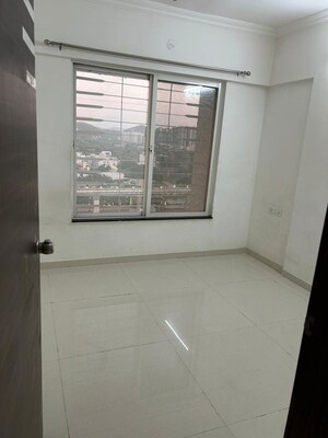 Room in 2 BHK Apartment at GK Atlanta Phase I, Wakad – for Rent