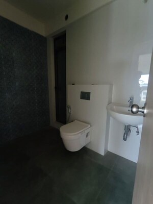 Bathroom in 4 BHK Apartment at Raj Infinia, Malad West – for Rent