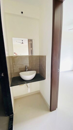 Bathroom in 2 BHK Apartment at Kamalraj Datta Vihar, Moshi – for Rent