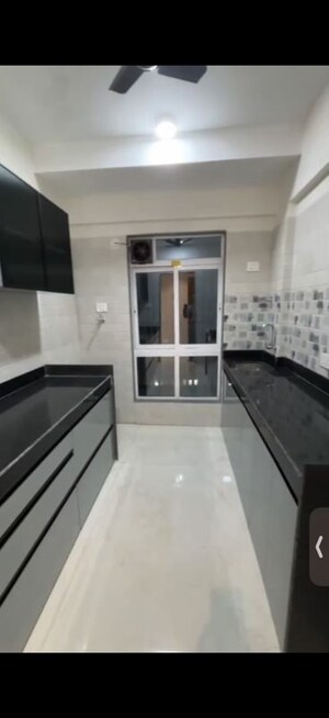 Kitchen in 2 BHK Apartment at Aditi Shristi Residency, Jogeshwari East – for Rent