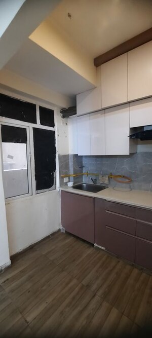 Kitchen in 2 BHK Apartment at Mahagun Mywoods, Sector 16c Greater Noida – for Rent