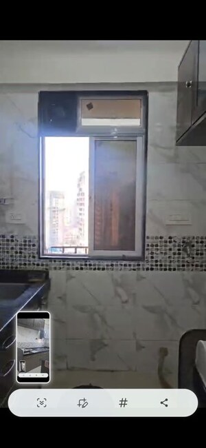 Kitchen in 2 BHK Apartment at DGS Sheetal Tapovan, Malad East – for Sale