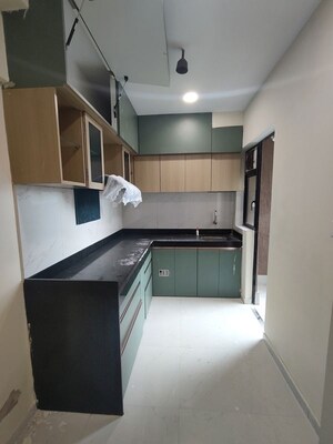 Kitchen in 2 BHK Apartment at Runwal Gardens Phase I, Dombivli East – for Rent