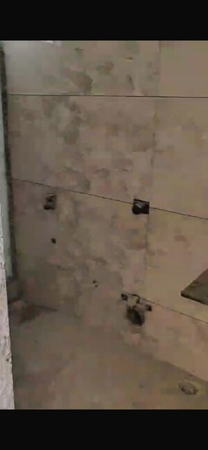 Bathroom in 2 BHK Apartment at Raunak Unnathi Woods Supreme, Ghodbunder Road – for Sale
