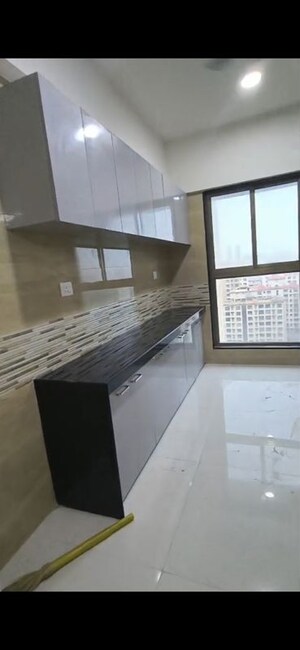 Kitchen in 2 BHK Apartment at Rajesh Raj Infinia, Malad West – for Rent