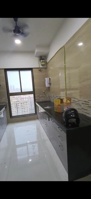 Kitchen in 2 BHK Apartment at Rajesh Raj Infinia, Malad West – for Rent