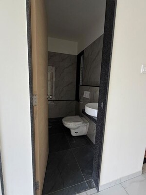 Bathroom in 1 BHK Apartment at MICL Aaradhya Parkwood, Mira Road – for Rent