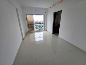 Living Room in 1 BHK Apartment at Dem Icon, Charkop Sector 2 – for Sale