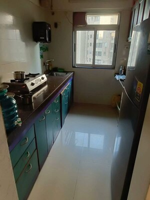 Kitchen in 2 BHK Apartment at Vihang Hills, Ghodbunder Road – for Rent