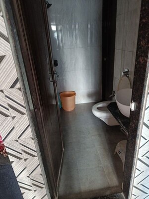 Bathroom in 2 BHK Apartment at Vihang Hills, Ghodbunder Road – for Rent