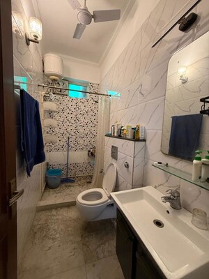 Bathroom in 2 BHK Builder Floor at Nehru Enclave – for Rent