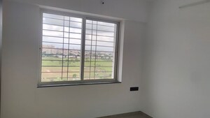 Room in 2 BHK Apartment at Skyrise Sparkle, Dhanori – for Rent
