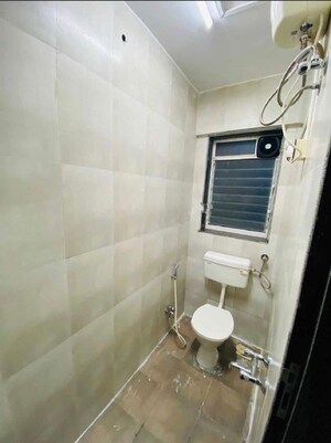 Bathroom in 4 BHK Apartment at Dheeraj Insignia, Bandra East – for Rent