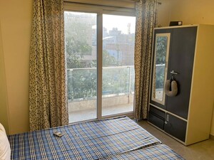 Bedroom in 2 BHK Builder Floor at AWHO Apartments, Sector 22 – for Rent