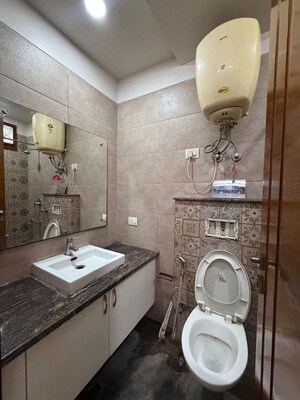 Bathroom in 2 BHK Builder Floor at Kalkaji – for Rent