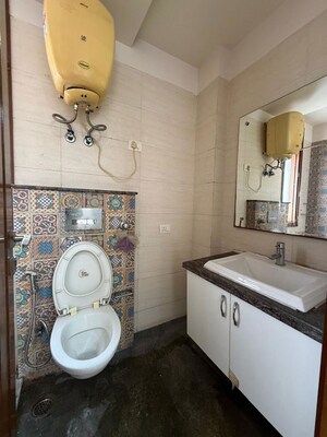 Bathroom in 2 BHK Builder Floor at Kalkaji – for Rent