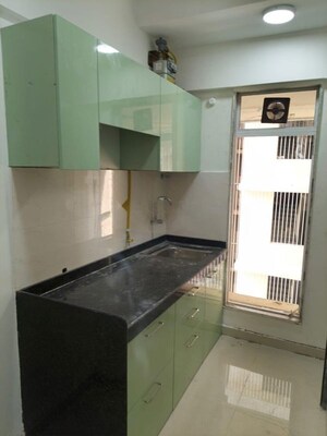 Kitchen in 2 BHK Apartment at Sushanku Avenue 36, Goregaon West – for Rent