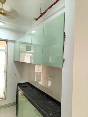 Kitchen in 2 BHK Apartment at Sushanku Avenue 36, Goregaon West – for Rent