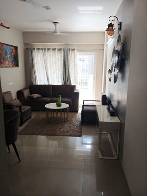 Living Room in 2.5 BHK Apartment at Shri Radha Sky Gardens, Sector 16b Greater Noida – for Sale