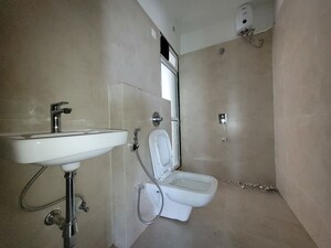 Bathroom in 2 BHK Apartment at Puranik City Reserva, Ghodbunder Road – for Rent