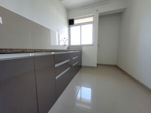 Kitchen in 2 BHK Apartment at Puranik City Reserva, Ghodbunder Road – for Rent