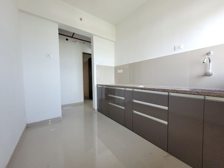 Kitchen, puranik-city-reserva 2 Bedroom 850 Sq.Ft. Apartment In Ghodbunder Road Thane 10559449