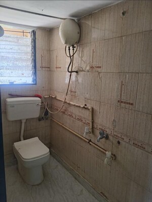 Bathroom in 2 BHK Apartment at Dynamix Divum, Malad East – for Rent