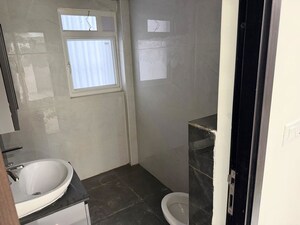 Bathroom in 3 BHK Apartment at Ambience Courtyard, Manikonda – for Sale