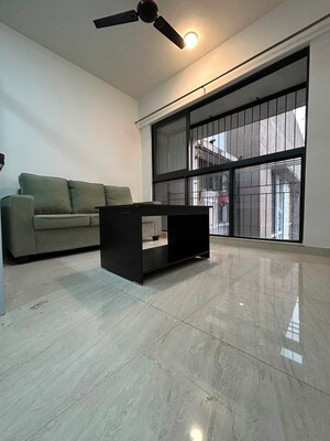 Living Room in 1 BHK Apartment at Lodha Crown Quality Homes, Majiwada – for Rent