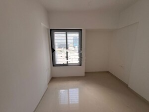Room in 2 BHK Apartment at Raga Top Towers, Wakad – for Rent