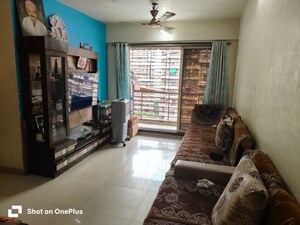 Living Room in 2 BHK Apartment at Bhoomi Trivas CHS Ltd, Kharghar – for Rent