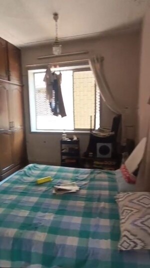 Living Room in 1 BHK Apartment at Bela Court 1, Colaba – for Rent