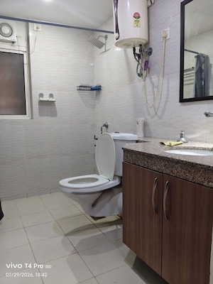 Bathroom in 4 BHK Apartment at Lotus Panache, Sector 110 – for Rent