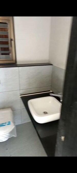 Bathroom in 2 BHK Apartment at Paranjape Blue Ridge, Hinjewadi – for Rent