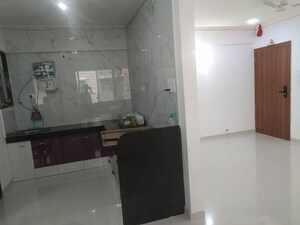 Kitchen in 2 BHK Apartment at Nirman Milestone, Ravet – for Rent
