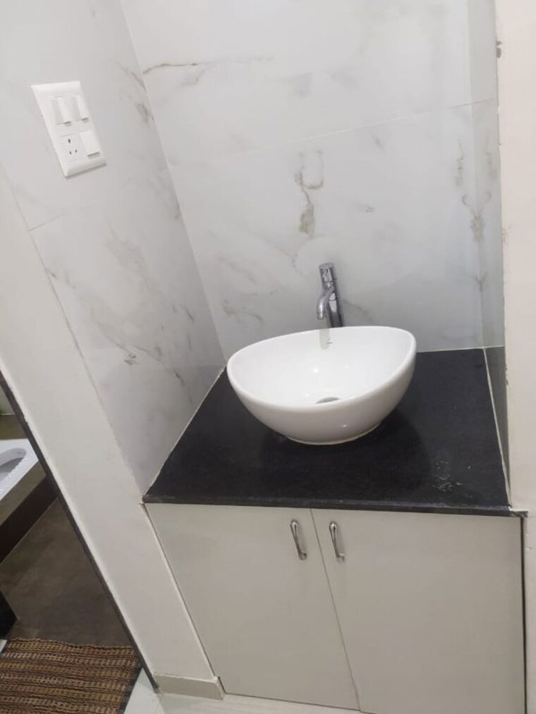 Bathroom, nirman-milestone 2 Bedroom 750 Sq.Ft. Apartment In Ravet Pune 10559931