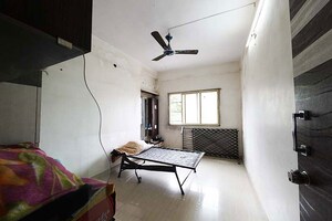 Living Room in 2 BHK Apartment at Asarwa – for Sale