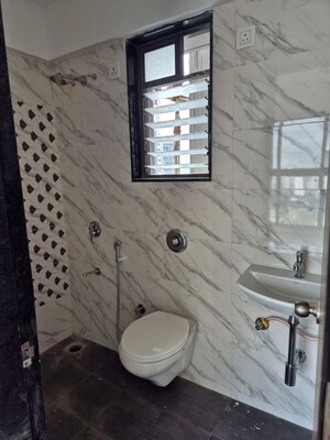 Bathroom in 1 BHK Apartment at UK Iridium, Kandivali East – for Rent
