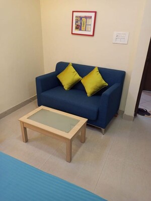 Living Room in Studio Apartment at Supertech Ecociti, Sector 137 – for Rent