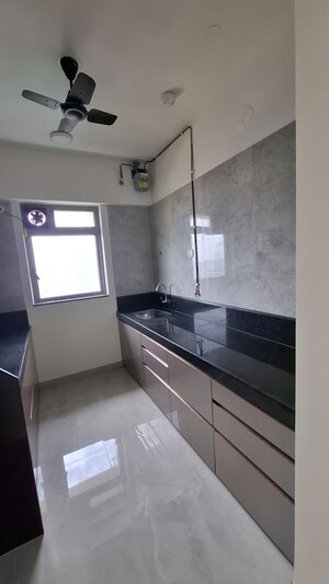 Kitchen in 2 BHK Apartment at Sheth Irene, Malad West – for Sale