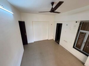 Room in 2 BHK Apartment at SSD Goregaon Pearl CHSL, Goregaon West – for Sale