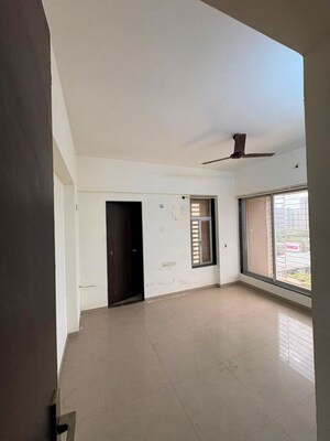 Room in 2 BHK Apartment at SSD Goregaon Pearl CHSL, Goregaon West – for Sale