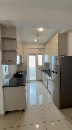 Kitchen in 2.5 BHK Apartment at Gulshan Botnia, Sector 144 – for Rent