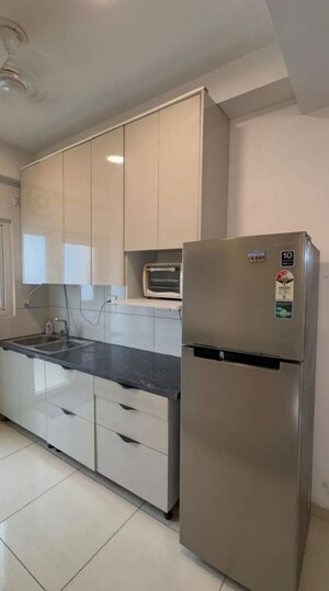 Kitchen in 2.5 BHK Apartment at Gulshan Botnia, Sector 144 – for Rent